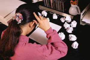 C002_Woman wCrumpled paper